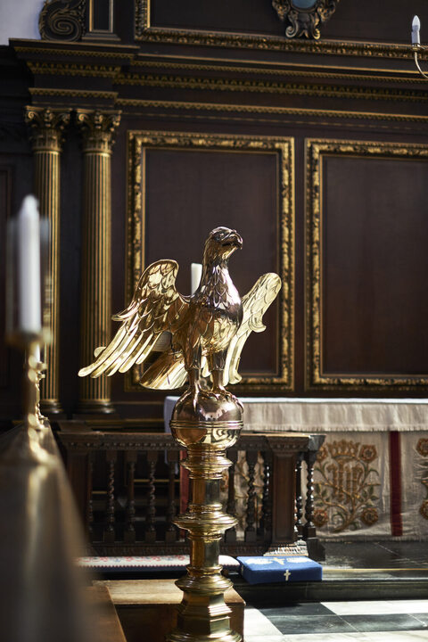 A photograph of a fine golden-coloured lectern, the head of which is an eagle